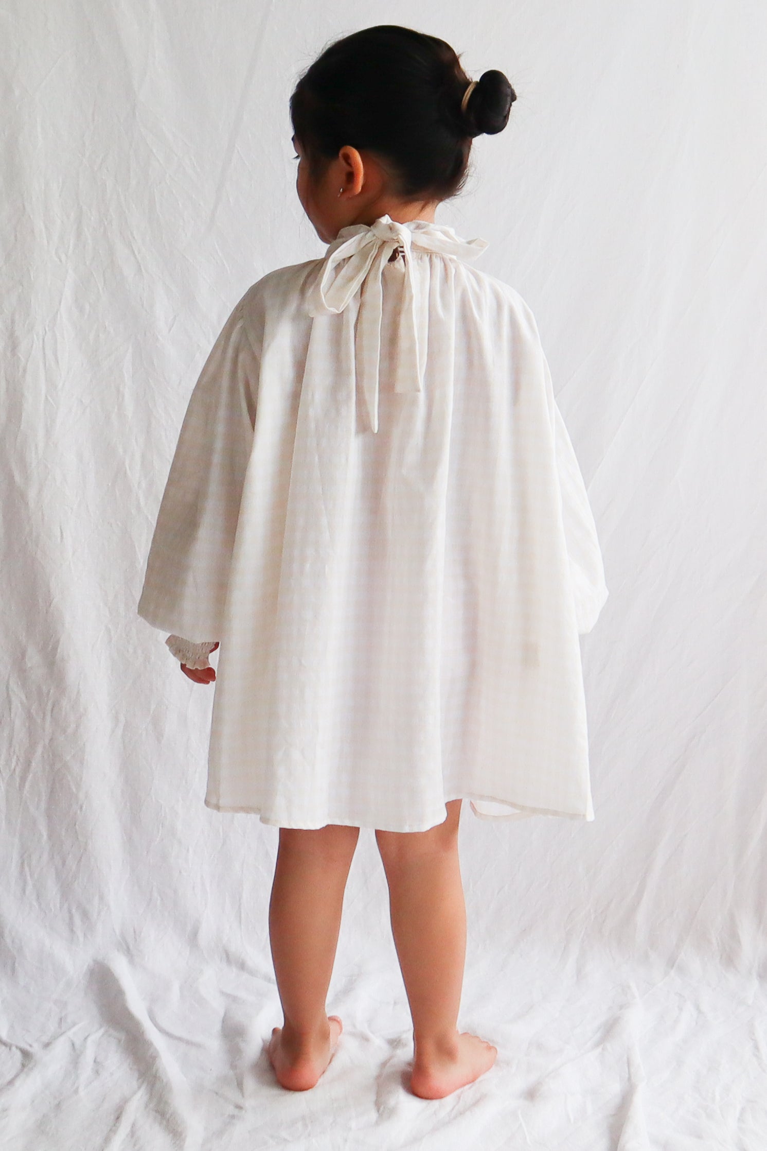 Celeste Tie Smock Dress in Beige Gingham Wovenwear Studio Celeste Tie Smock Dress in Beige Gingham Wovenwear Studio